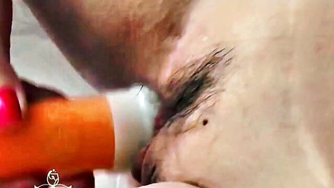 Cassiana Costa's tight pussy procedure with orange toy insertion close-up