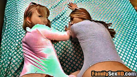 Blonde teen wrestles brunette step-relative on bed, asses exposed in family sex play