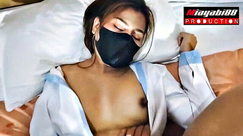 Miayabi88 topless Asian beauty lies exposed on bed with face mask