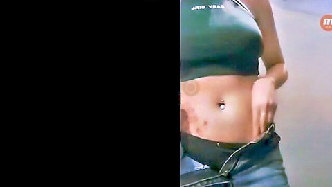 Slim Asian woman in green crop top teases navel piercing in amateur live cam