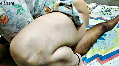 Big pale ass woman in doggy style position with hairy man behind her on colorful bed