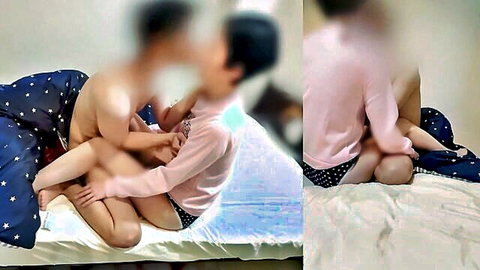 Blurry JAV stepdaughter in pink hoodie straddles nude stepdad in bed, intimate creampie taboo