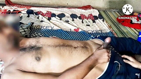 Hairy Indian man exposes erect penis with small hand nearby in amateur clip