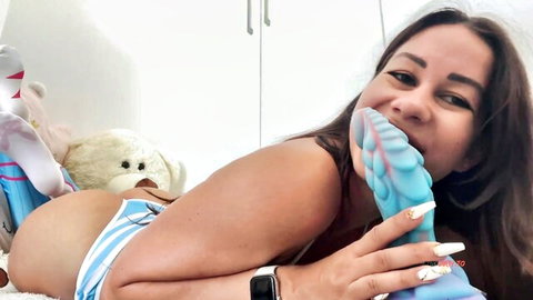 Lia-Fox teases mouth with XXL blue dragon dildo in solo play