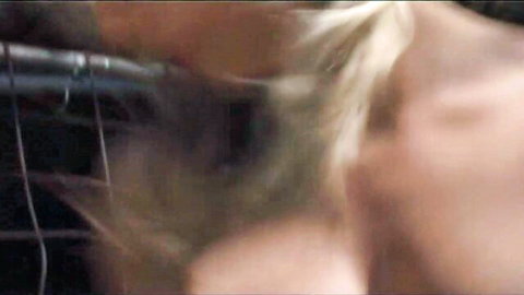 Blonde babe in wild rodeo cage scene