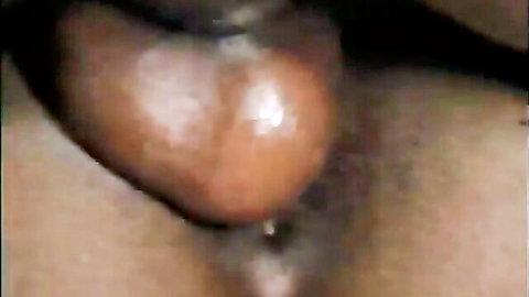 Huge black cockhead stretching tight pink pussy lips during intense penetration