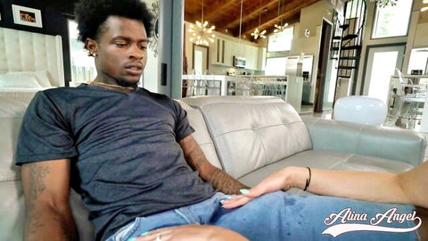 Light-skinned babe gropes massive BBC bulge through jeans on couch