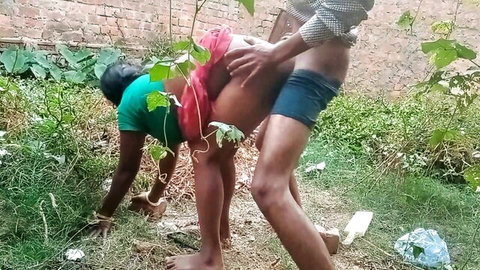 Indian bhabhi bent over in red skirt, pounded doggy style outdoors by boyfriend