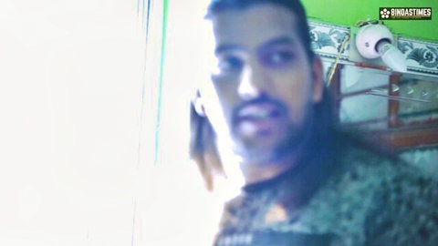 Bearded Indian man with long hair in intense gaze, homemade huge tits bhabhi seduction scene