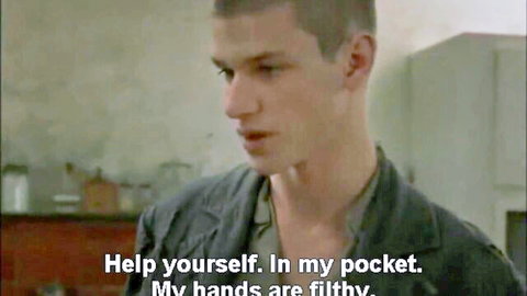 Filthy-handed man offers pocket help in tense indoor encounter