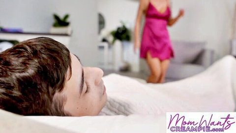 Blonde MILF stepmom in pink lingerie sneaks toward sleeping stepson in bed