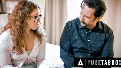 Curly brunette teen with glasses and big tits chats intimately with older man on bed in taboo scene