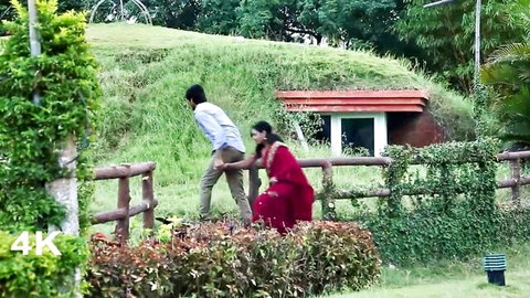 Indian housewife in red saree seduces neighbor with her curves outdoors