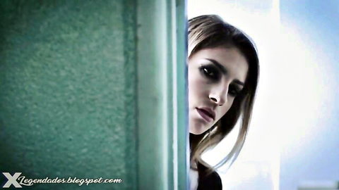 Seductive brunette student peeking from classroom door in steamy professor encounter
