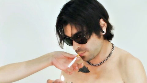 Savvy Suxx in fan girl fantasy with shirtless hunk smoking cigarette