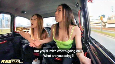Anastasia and Ginebra in green and white tanks, surprised in taxi threesome setup
