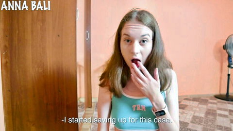 Innocent Anna Bali surprised with hand over mouth in turquoise top
