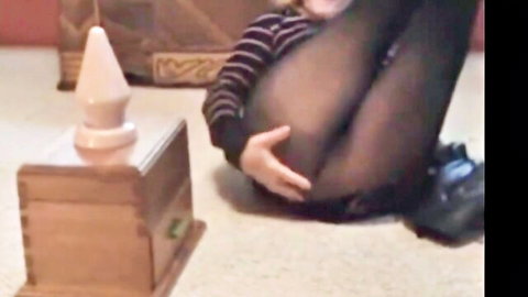 Mature granny in stockings teases ass with dildo solo play