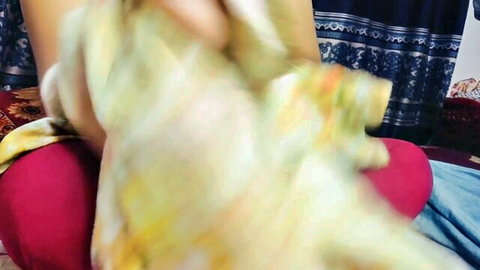 Naughty Indian housewife spreading legs teasing tight pussy with yellow cloth on bed