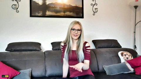 Secret_Dream smiles confidently in red top for her first solo video