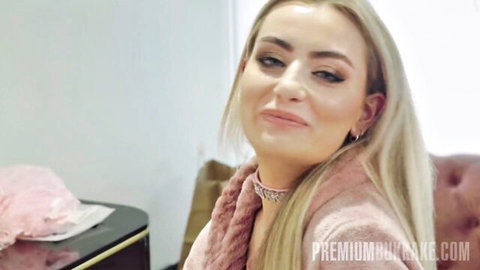 Emily Belle blonde in sexy pink fuzzy jacket for hot interview