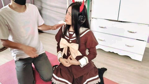 Slim Taiwanese anime cosplay girl in school uniform kneels for otaku blowjob