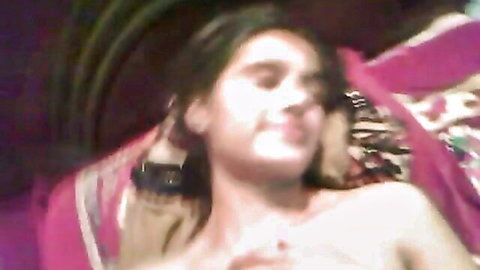 Blurry closeup of topless woman smiling during titfuck and missionary pounding