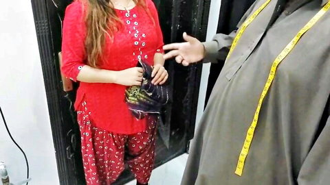 Indian village wife in red salwar kameez teases tailor in shop before steamy Desi sex