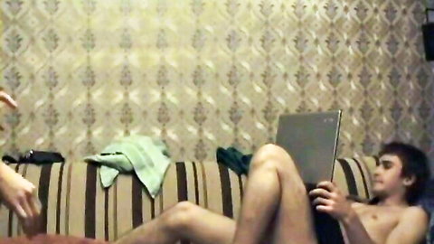Amateur Valery sucking dick on naked man with laptop