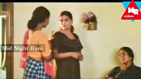Three busty mature Indian women in sarees stand teasingly in a room for hot South Asian threesome