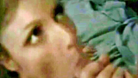 Close-up of seductive woman's face with parted lips glancing sideways