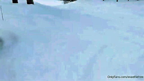 Naughty young blonde skier in tight black suit speeding down snowy slope on OnlyFans