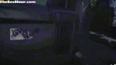 Blurry dark night exterior of black van with DVD sticker and theSexHour.com watermark