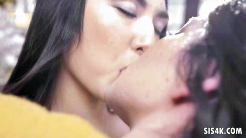 Mina Moon and Sawyer Cassidy in passionate lesbian kiss