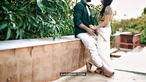 Busty Indian MILF in outdoor couple scene with big tits and intimate pose