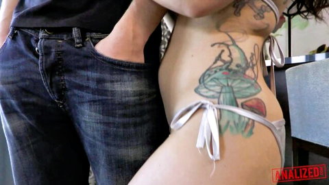 Gabriella Paltrova's tattooed hips in thong, man gripping for anal punishment
