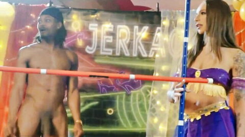 Nude black stuntman with big cock poses with sexy belly dancer