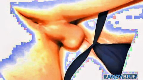 Glowing muscular male ass cheeks split by black jockstrap strap in erotic closeup