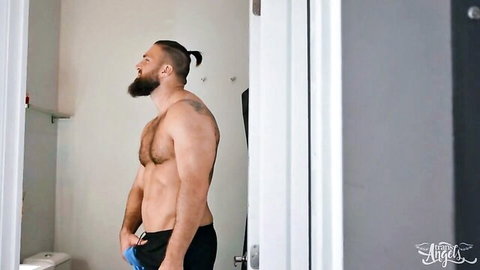 Muscular bearded hunk with man bun in black shorts, Trans Angels teaser