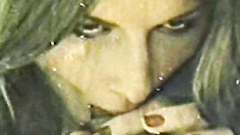 Retro porn thumbnail of Suzanne Britton close-up face in vintage erotic loop