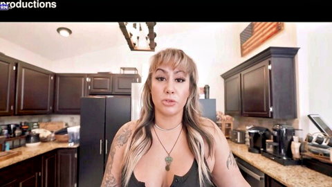 Misty Meaner blonde MILF in low-cut top, teasing cleavage in kitchen