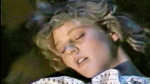 Blonde woman in ecstasy, eyes closed, during outdoor hotwife sex in Army Brat 2