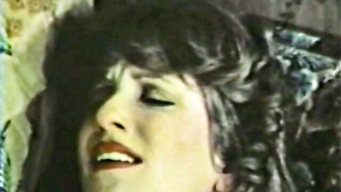 Brunette woman moaning in ecstasy, Ron Jeremy classic XXX close-up