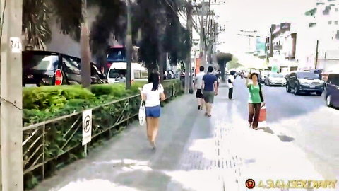 Brunette in tight shorts walking Asian street before hard pussy drilling