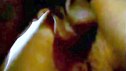 Close-up of ebony pussy creampied with thick white cum dripping from dark labia