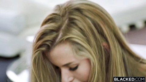 Blonde pornstar Mia Melano seductive close-up gaze in Blacked video