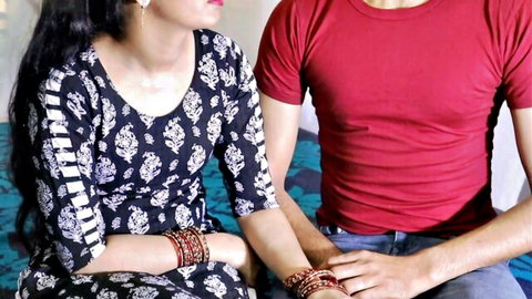 Desi Indian Bhabhi in traditional dress with husband on wedding night