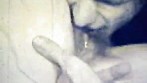 Vintage close-up of hairy pussy with fingers spreading wet labia