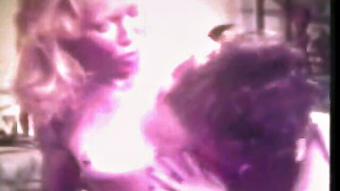 Vintage retro blonde lesbian girls kissing passionately in classic XXX scene