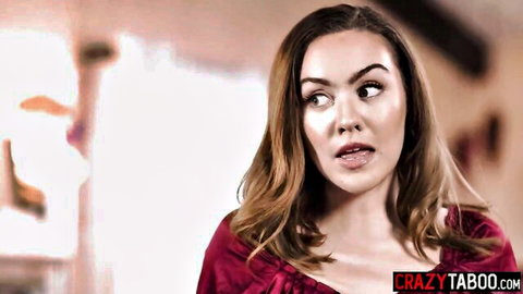 Surprised brunette beauty with wide eyes and open mouth in red top